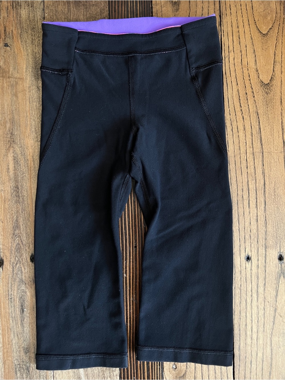 2/$20 Kids • Ivivva Girls Black Crop Leggings Size 4 Pink Purple Waistband